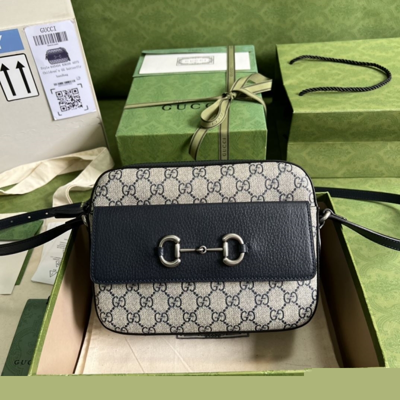 G*u*i clutch bags
